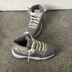 I am selling these retro 11 cool grey’s that have been worn 4 times.